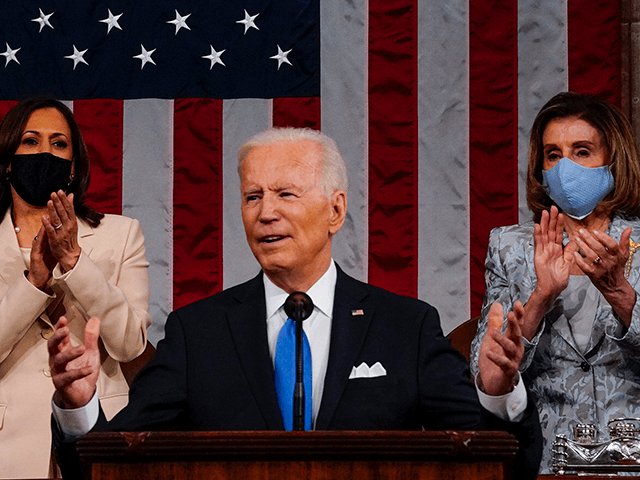 U.S. President Joe Biden addresses a joint session of Congress as Vice President Kamala Harris (L) and Speaker of the House U.S. Rep. Nancy Pelosi (D-CA) (R) look on in the House chamber of the U.S. Capitol April 28, 2021 in Washington, DC. On the eve of his 100th day …