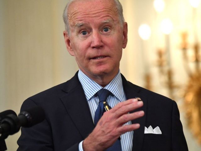 US President Joe Biden answers a reporter's question after speaking about the Covid-19 res