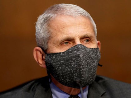 Dr. Anthony Fauci, director of the National Institute of Allergy and Infectious Diseases, arrives during a Senate Health, Education, Labor and Pensions Committee hearing to discuss the on-going federal response to Covid-19 on May 11, 2021 at the US Capitol in Washington, DC. (Photo by Greg Nash / POOL / …