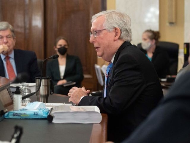 US Senate Minority Leader Senator Mitch McConnell, Republican of Kentucky, attends a Senate Administration and Rules Committee mark up business meeting on S.1, For the People Act, legislation that would overhaul voting rights and election oversight, on Capitol Hill in Washington, DC, May 11, 2021. (Photo by SAUL LOEB / …