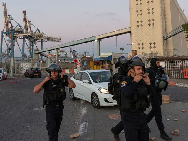 HAIFA, ISRAEL - MAY 13: Police officers prepare and get final orders before going out to e