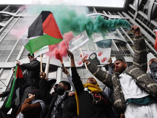 LONDON, ENGLAND - MAY 15: Protesters gather outside the Israeli Embassy as demonstrators s