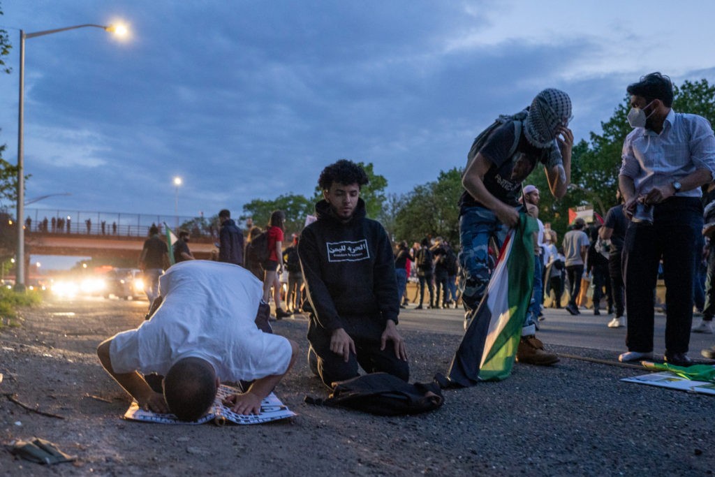 People stop to pray on the highway during a rally for Nakba Day in New York City. The commemoration of  Al Nakba, which literally translates to The Catastrophe refers to the exodus of 750,000 Palestinians amid Israels declaration of independence in 1947. (David Dee Delgado/Getty Images)