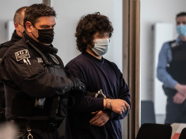 DRESDEN, GERMANY - MAY 21: (EDITORS NOTE: Parts of this image have been pixellated to obscure the identity of the defendant) Defendant Abdullah A. arrives before hearing the verdict of his trial for murder on May 21, 2021 in Dresden, Germany. Abdullah A. is a refugee from Syria whom authorities …