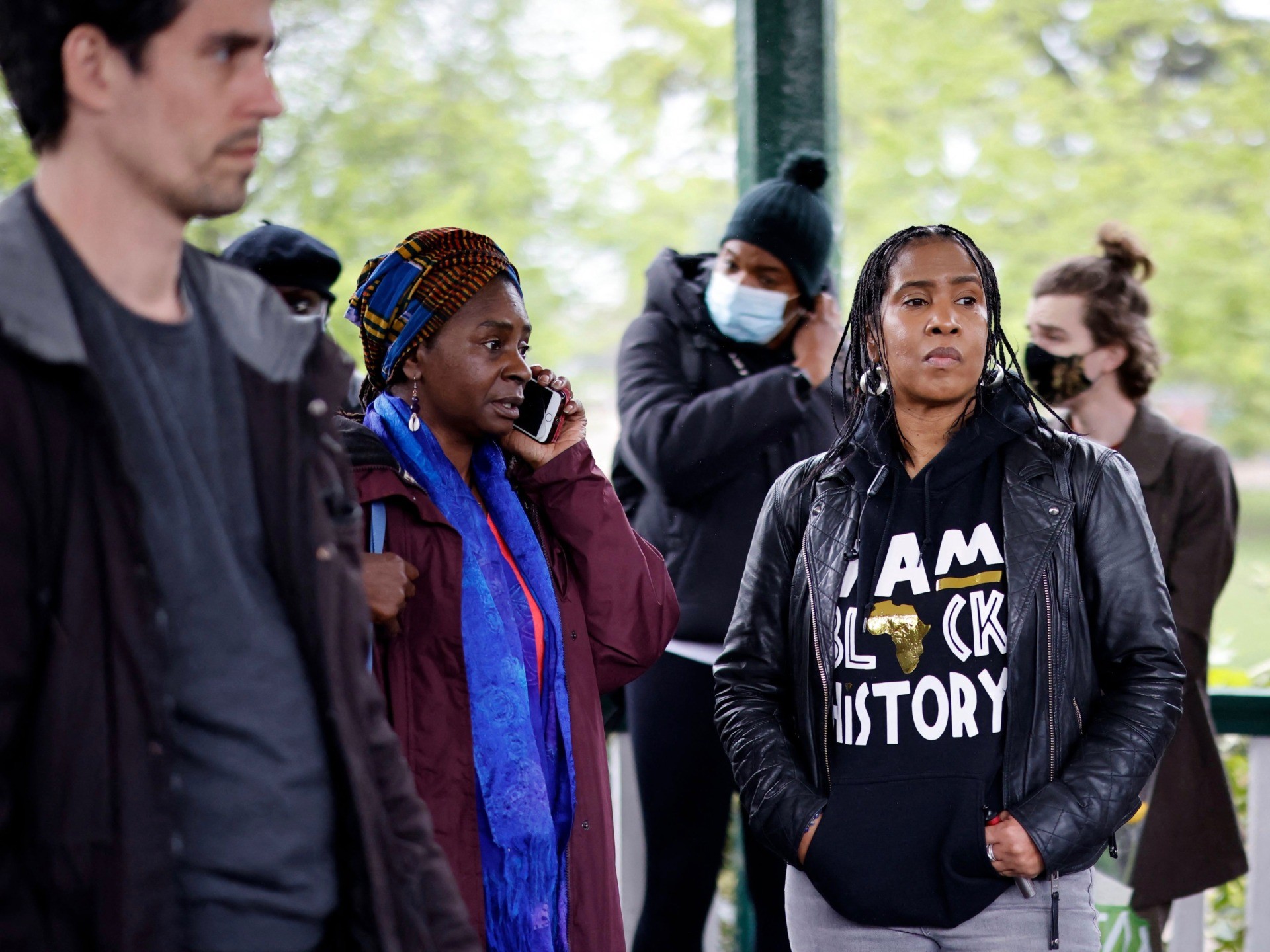People attend a vigil for activist Sasha Johnson at the bandstand in Ruskin Park in London on May 24, 2021. - Black equal rights activist Sasha Johnson was on Monday in hospital after being caught up in gunfire when violence erupted at a party in south-east London, in the early hours of the morning on May 23. Police said there is no evidence that the 27-year-old campaigner was the intended target of the shooting. (Photo by Tolga Akmen / AFP) (Photo by TOLGA AKMEN/AFP via Getty Images)