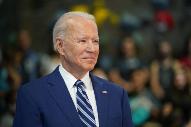 US President Joe Biden waits to speak as he visits the Sportrock Climbing Centers in Alexandria, Virginia on May 28, 2021. (Photo by MANDEL NGAN / AFP) (Photo by MANDEL NGAN/AFP via Getty Images)
