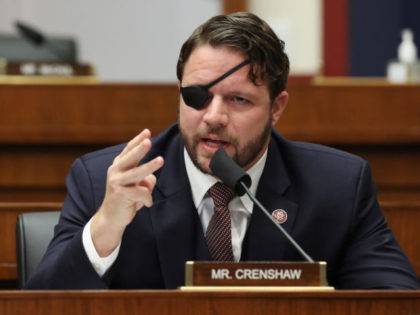 WASHINGTON, DC - SEPTEMBER 17: House Homeland Security Committee member Rep. Dan Crenshaw (R-TX) questions witnesses during a hearing on 'worldwide threats to the homeland' in the Rayburn House Office Building on Capitol Hill September 17, 2020 in Washington, DC. Committee Chairman Bennie Thompson (D-MS) said he would issue a …