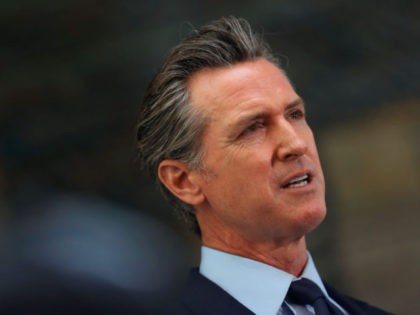 OAKLAND, CALIFORNIA - MAY 10: California Gov. Gavin Newsom looks on during a press conference at The Unity Council on May 10, 2021 in Oakland, California. California Gov. Gavin Newsom announced a $100 billion economic recovery package for the state that would include a new round of $600 stimulus checks …
