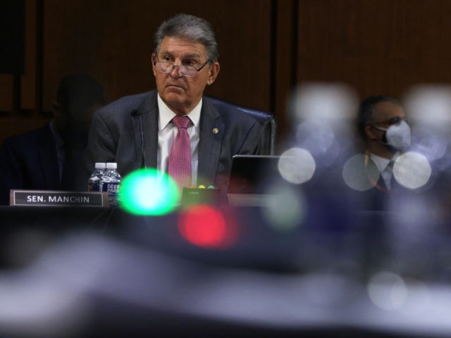 WASHINGTON, DC - MAY 12: U.S. Sen. Joe Manchin (D-WV) listens during a hearing before the Senate Appropriations Committee at Hart Senate Office Building on May 12, 2021 on Capitol Hill in Washington, DC. The committee held a hearing on “Domestic Violent Extremism in America.” (Photo by Alex Wong/Getty Images)