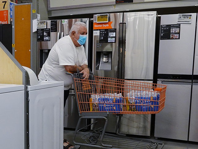 PEMBROKE PINES, FLORIDA - MAY 12: A customer in the appliance department at a Home Depot store on May 12, 2021 in Pembroke Pines, Florida. Reports indicate that consumer prices surged in April, with it attributed to a bottleneck in companies getting supplies for manufacturing and rising demand from consumers …