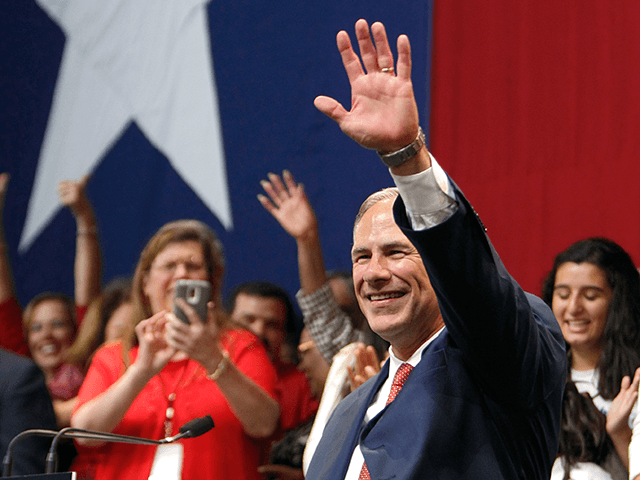 Texas Attorney General and Republican gubernatorial candidate Greg Abbott celebrates durin