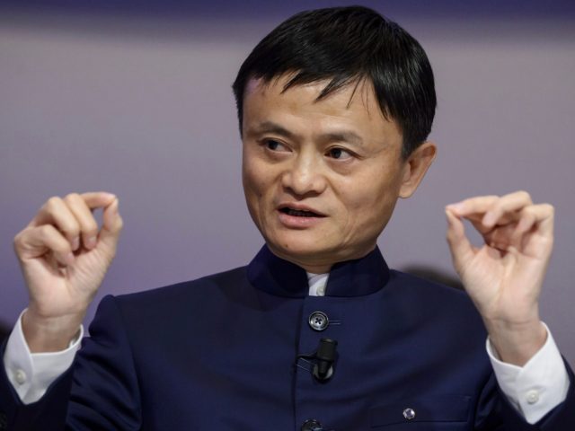 Alibaba Group Founder and Executive Chairman Jack Ma gestures as he speaks during a session of the World Economic Forum (WEF) annual meeting on January 23, 2015 in Davos. AFP PHOTO / FABRICE COFFRINI (Photo credit should read FABRICE COFFRINI/AFP via Getty Images)