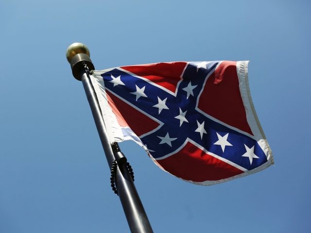 COLUMBIA, SC - JUNE 23: The Confederate flag is seen flying on the Capitol grounds a day after South Carolina Gov. Nikki Haley announced that she will call for the Confederate flag to be removed on June 23, 2015 in Columbia, South Carolina. Debate over the flag flying on the …