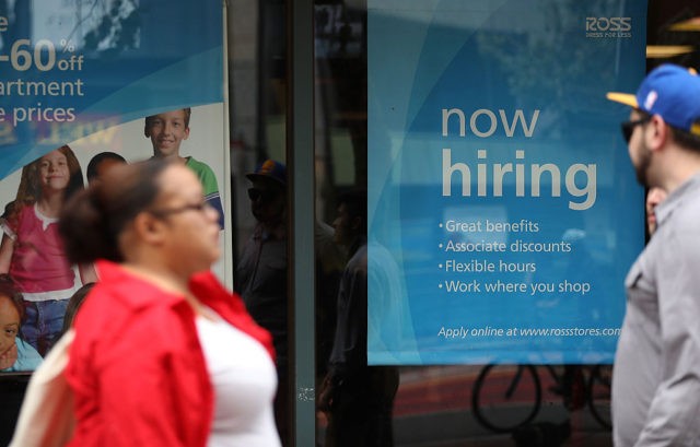 SAN FRANCISCO, CA - JULY 08: A 'now hiring' sign is posted outside of a Ross Dress for Less store on July 8, 2016 in San Francisco, California. According to the the U.S. Labor Department, employment growth surged with 287,000 added jobs in June. The unemployment rate inched up to …