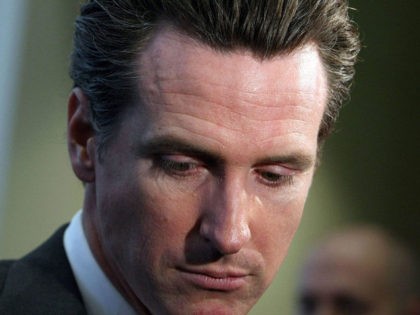 SAN FRANCISCO - OCTOBER 27: San Francisco mayor Gavin Newsom pauses while speaking at the grand opening of the new Charles Schwab office October 27, 2009 in San Francisco, California. After one year on the campaign trail, San Francisco mayor Gavin Newsom dropped out of the race for California governor …