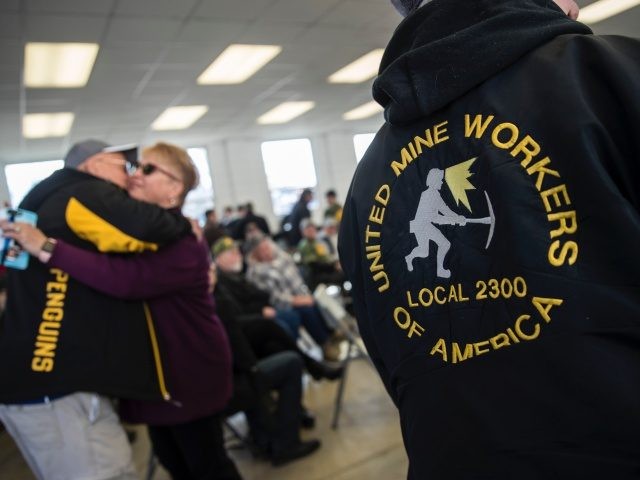 WAYNESBURG, PA - MARCH 11: United Mine Workers of America (UMWA) members attend a campaign rally for Conor Lamb, Democratic Congressional candidate for Pennsylvania's 18th district, at the Greene County Fairgrounds, March 11, 2018 in Waynesburg, Pennsylvania. Lamb is running in a tight race for the vacated seat of Congressman …