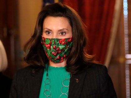 In this photo provided by the Michigan Office of the Governor, Gov. Gretchen Whitmer speaks during a news conference in Lansing, Mich., Thursday, Dec. 10, 2020. Whitmer, whose health department has prohibited indoor restaurant dining and closed various entertainment venues to limit the spread of the virus, announced that those …