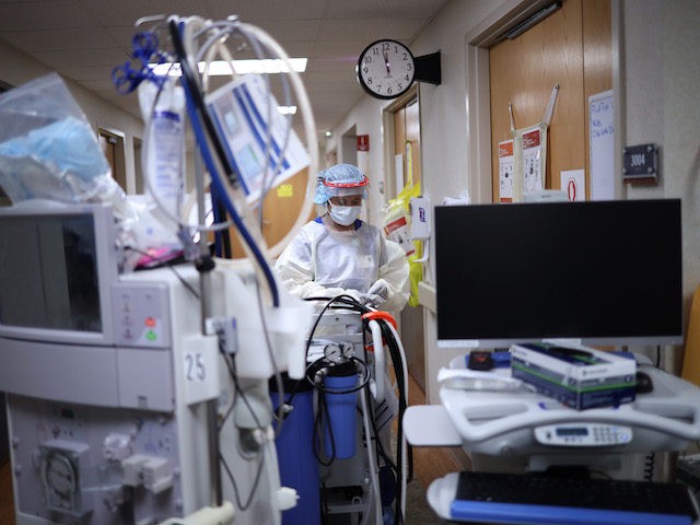 LEONARDTOWN, MARYLAND - MAY 01: (EDITORIAL USE ONLY) A member of the dialysis prepares to
