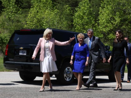 US First Lady Jill Biden followed by actress Jennifer Garner (R) and Senator Joe Manchin (