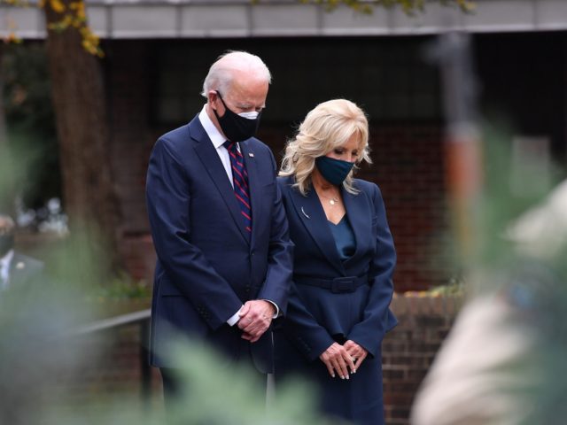 US President-elect Joe Biden and his wife Jill Biden pray during a Veterans Day stop at the Korean War Memorial Park in Philadelphia, Pennsylvania on November 11, 2020. - The leaders of close US allies on November 10, 2020 telephoned President-elect Joe Biden and pledged to work together but in …