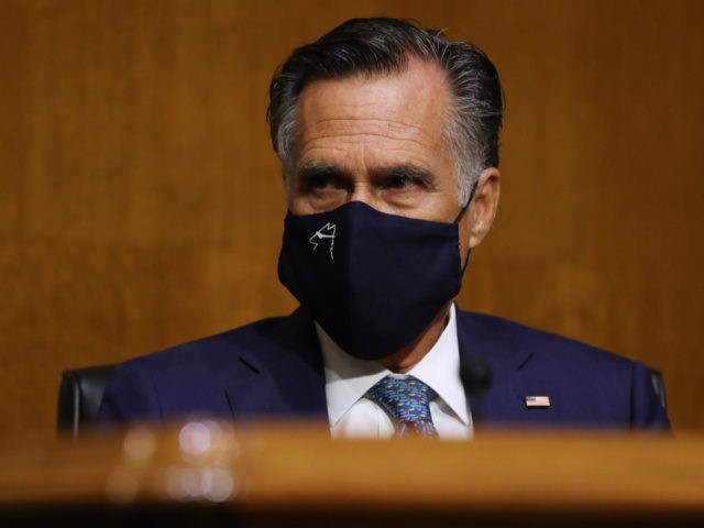 Wearing ammask to reduce the risk of spread of the novel coronavirus, Senate Foreign Relations Committee member Sen. Mitt Romney (R-UT) attends a hearing about Venezuela in the Dirksen Senate Office Building on Capitol Hill August 04, 2020 in Washington, DC. Senators questioned State Department Special Representative for Venezuela Elliot …