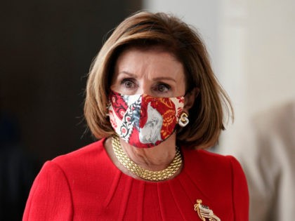 House Speaker Nancy Pelosi, D-Calif., walks to a news conference at the Capitol in Washing