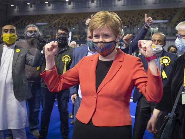 First Minister and SNP party leader Nicola Sturgeon celebrates after retaining her seat for Glasgow Southside at the count for the Scottish Parliamentary Elections in Glasgow, Scotland, Friday May 7, 2021. On winning her seat in Glasgow, Nicola Sturgeon, said early results indicated that her party was on course to …