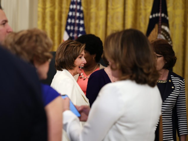 WASHINGTON, DC - MAY 20: U.S. Speaker of the House Nancy Pelosi (D-CA) mingles with guests