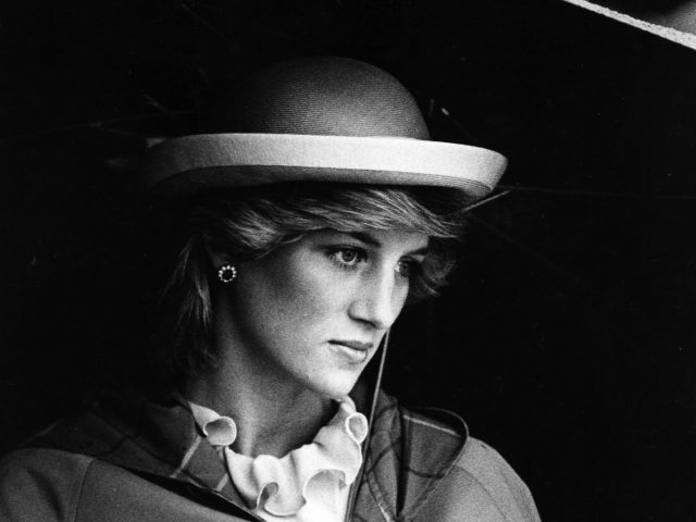 Lady Diana Spencer (1961 - 1997), future Princess of Wales sheltering under an umbrella. (Photo by Hulton Archive/Getty Images)