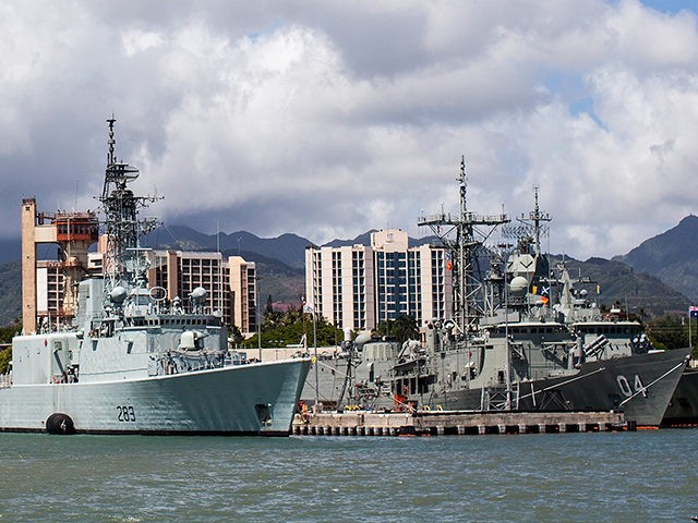The HMCS Algonquin sits pier side along with the the HMAS Darwin at Joint Base Pearl Harbo