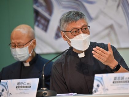 Newly appointed Bishop of Hong Kong Rev. Stephen Chow (R) speaks at a press conference with Cardinal John Tong (L) in Hong Kong on May 18, 2021. (Photo by Peter PARKS / AFP) (Photo by PETER PARKS/AFP via Getty Images)
