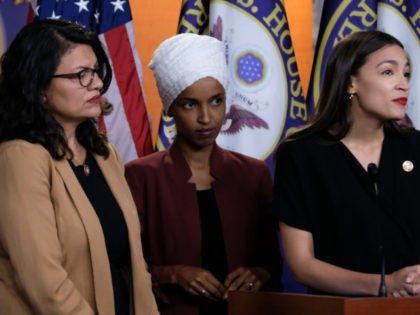 WASHINGTON, DC - JULY 15: U.S. Reps. Rashida Tlaib (D-MI), Ilhan Omar (D-MN) and Alexandria Ocasio-Cortez (D-NY) listen during a news conference at the U.S. Capitol on July 15, 2019 in Washington, DC. President Donald Trump stepped up his attacks on the four progressive Democratic congresswomen, saying that if they're …