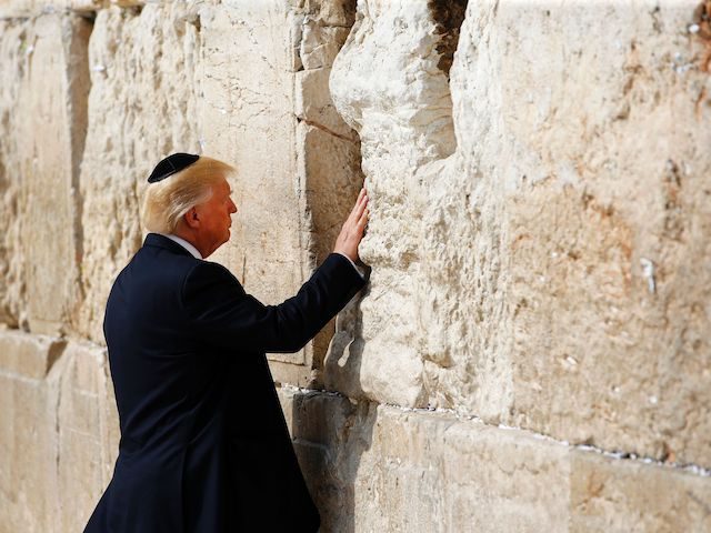US President Donald Trump visits the Western Wall, the holiest site where Jews can pray, in Jerusalems Old City on May 22, 2017. / AFP PHOTO / POOL / RONEN ZVULUN (Photo credit should read RONEN ZVULUN/AFP via Getty Images)