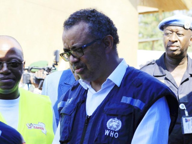 FILE - In this file photo dated Friday, Aug. 10, 2018, Dr. Tedros Adhanom Ghebreyesus, WHO Director General, speaks to a health official at a newly established Ebola response center in Beni, Democratic Republic of Congo. British, European and American diplomats and donors have voiced serious concerns about how the World Health Organization handled sex abuse allegations involving their own staff during an outbreak of Ebola in Congo. (AP Photo/Al-hadji Kudra Maliro, FILE)