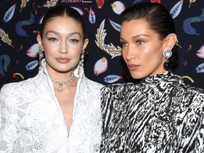 PARIS, FRANCE - FEBRUARY 26: (EDITORIAL USE ONLY) (L to R) Gigi Hadid and Bella Hadid attend the Harper's Bazaar Exhibition as part of the Paris Fashion Week Womenswear Fall/Winter 2020/2021 At Musee Des Arts Decoratifs on February 26, 2020 in Paris, France. (Photo by Pascal Le Segretain/Getty Images)