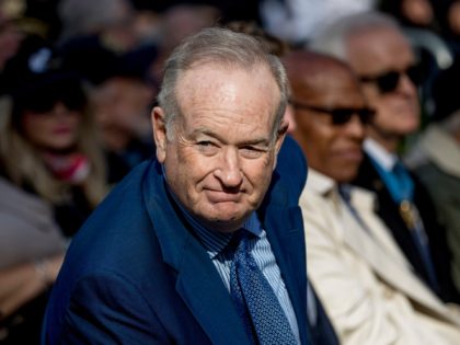 Bill O'Reilly, right, arrives before President Donald Trump and first lady Melania Trump participate in a wreath laying ceremony at the New York City Veterans Day Parade at Madison Square Park, in New York, Monday, Nov. 11, 2019. (AP Photo/Andrew Harnik)