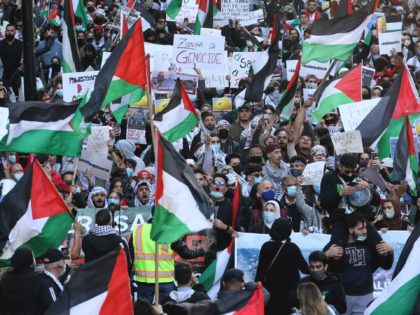 CHICAGO, ILLINOIS - MAY 12: Thousands of demonstrators march through downtown protesting I