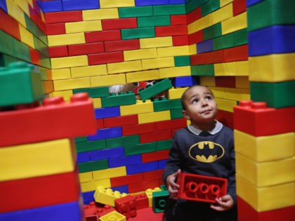 LONDON, ENGLAND - NOVEMBER 27: Marli Williams, 9, plays in a Lego building area on the ope