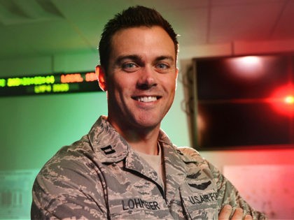 FILE -- In this July 22, 2015 file photo, Capt. Matthew Lohmeier, 460th Operations Group Block 10 chief of training, stands in the Standardized Space Trainer on Buckley Air Force Base, Colorado. (Darren Scott/U.S. Air Force)