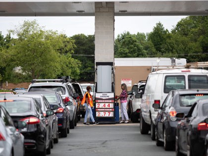 Cars line up to fill their gas tanks at a COSTCO at Tyvola Road in Charlotte, North Caroli