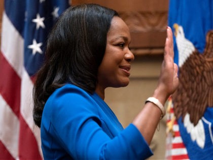 Kristen Clarke is sworn in by Vice President Kamala Harris, as assistant attorney general for civil rights, Tuesday, May 25, 2021, at the Department of Justice in Washington. (AP Photo/Jacquelyn Martin)