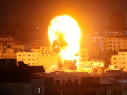 Fire and smoke rise above buildings in Gaza City as Israeli warplanes target the Palestinian enclave, early on May 17, 2021. - Israeli warplanes bombarded the Gaza Strip overnight, said witnesses in the Palestinian enclave, from where armed groups have launched rockets into the Jewish state. (Photo by Anas BABA …