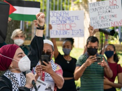 Protesters gather in front of the Israeli embassy to protest the Middle East war between Israelis and Palestinians, Tuesday, May 18, 2021, in Washington. (AP Photo/Alex Brandon)
