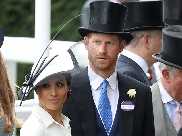 ASCOT, ENGLAND - JUNE 19: Meghan, Duchess of Sussex, Prince Harry, Duke of Sussex and Prince Charles, Prince of Wales attend Royal Ascot Day 1 at Ascot Racecourse on June 19, 2018 in Ascot, United Kingdom. (Photo by Chris Jackson/Getty Images)