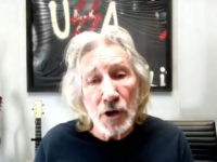 Roger Waters Sits by Poster Comparing America to Nazis, Trashes Israel