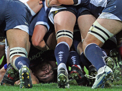 MELBOURNE, AUSTRALIA - APRIL 15: Rodney Blake of the Rebels is caught at the bottom of a ruck during the round nine Super Rugby match between the Melbourne Rebels and the Highlanders at AAMI Park on April 15, 2011 in Melbourne, Australia. (Photo by Scott Barbour/Getty Images)