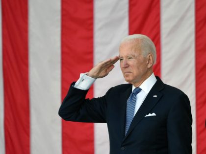US President Joe Biden salutes at the 153rd National Memorial Day Observance at Arlington National Cemetery on Memorial Day in Arlington, Virginia on May 31, 2021. (Photo by MANDEL NGAN / AFP) (Photo by MANDEL NGAN/AFP via Getty Images)