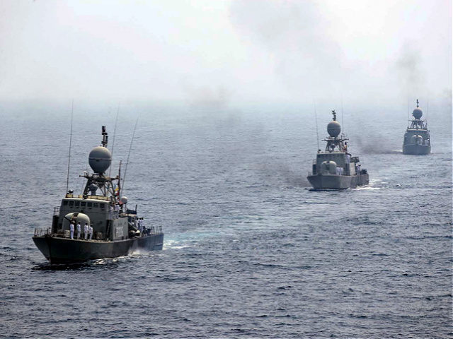 A handout picture provided by the Iranian Army official website on September 12, 2020, shows Iranian naval ships parading during the last day of a military exercise in the Gulf, near the strategic strait of Hormuz in southern Iran. (Photo by - / Iranian Army office / AFP) / XGTY …