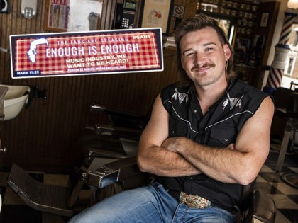 Country singer Morgan Wallen poses for a portrait after getting a mullet at Paul Mole Barb