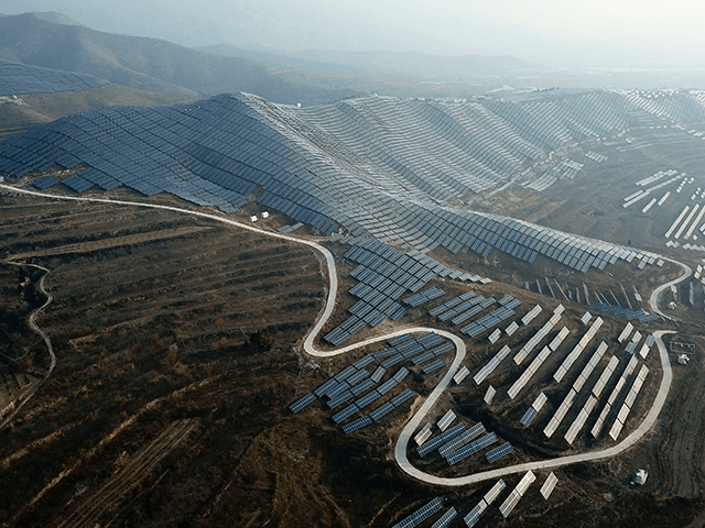 In this Nov. 28, 2019 file photo, a solar panel installation is seen in Ruicheng County in central China's Shanxi Province. Scientists say greenhouse gas emissions must start dropping sharply as soon as possible to prevent global temperatures rising more than 1.5 degrees Celsius (2.7 degrees Fahrenheit) by the end …